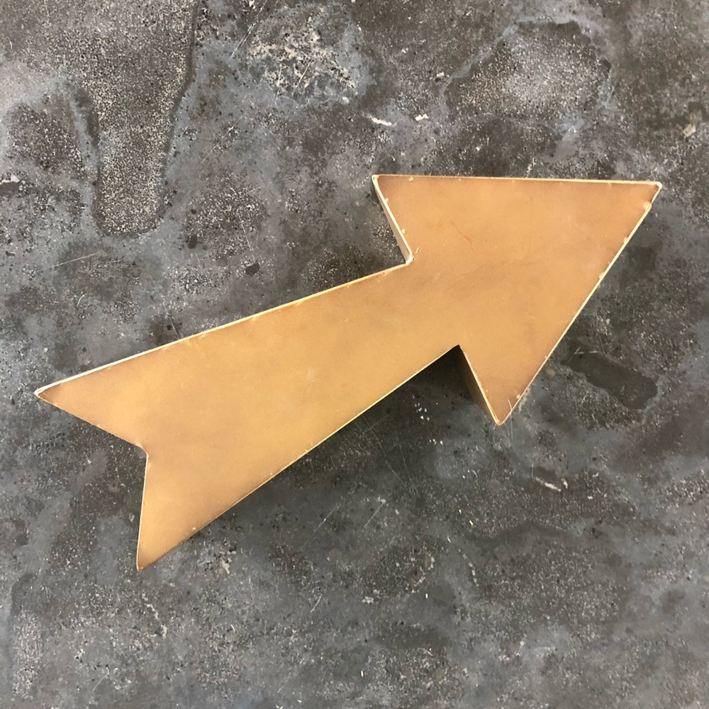 Metal gold arrow